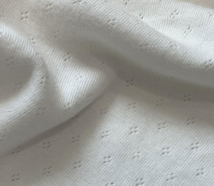 White cotton pointelle knit fabric for delicate 1990s lingerie style with diamond motif pattern in soft fabrication